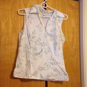 Sleeveless blouse. **Three $8 tops for $20**